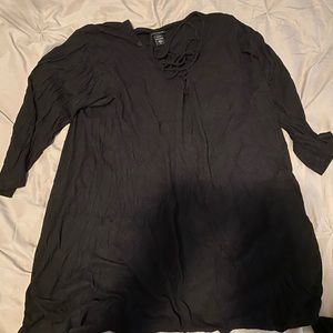 Long black shirt with straps across front